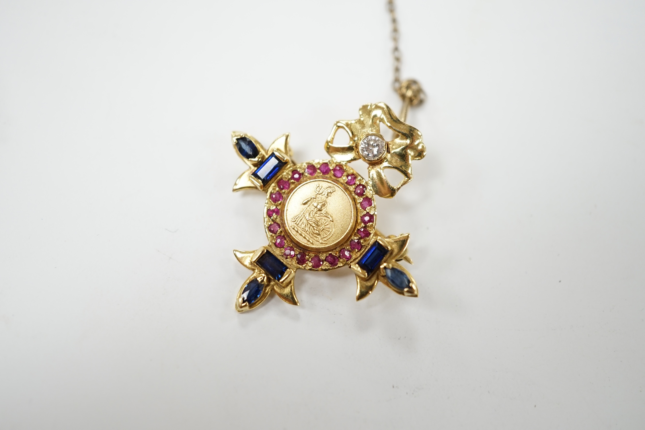 A modern 18ct gold, ruby, sapphire and diamond set brooch, depicting Brittania, 30mm, gross weight 6.3 grams. Condition - fair to good